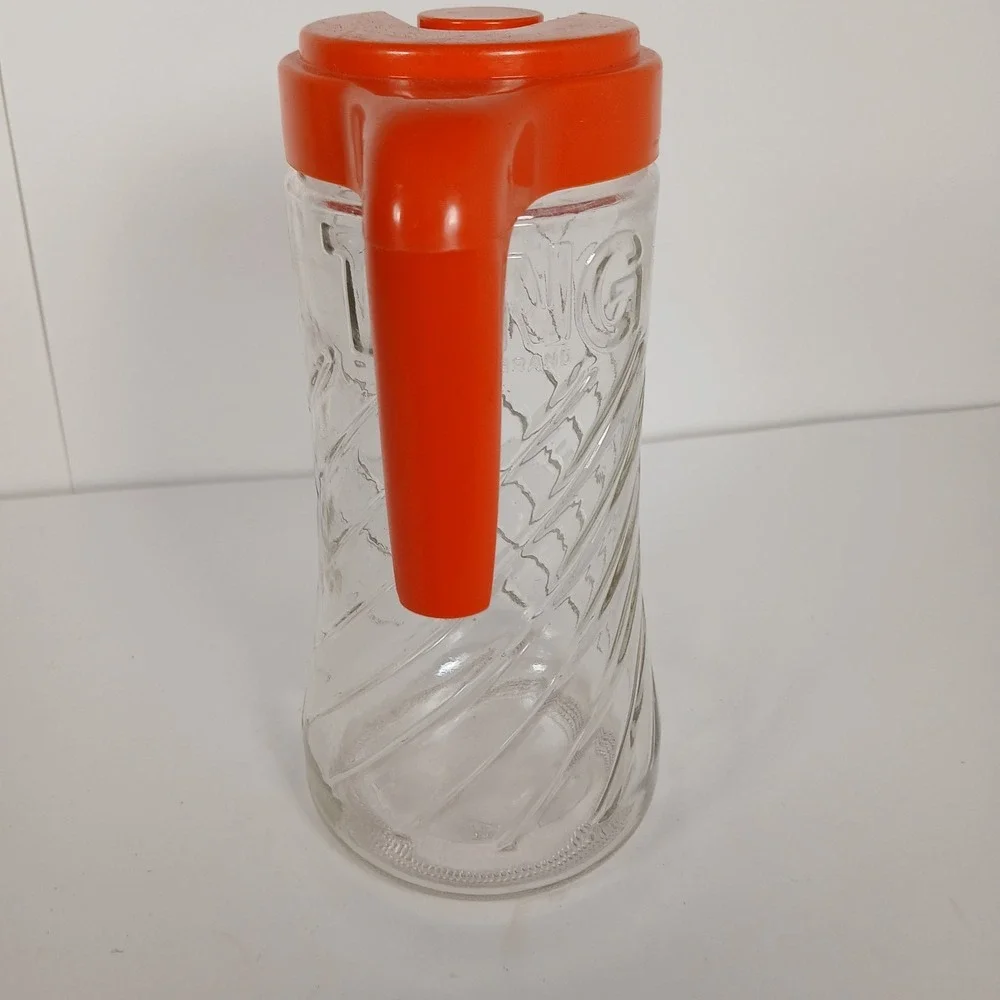Vintage Anchor Hocking Glass Swirled Tang Pitcher with Orange Flip-Top Lid